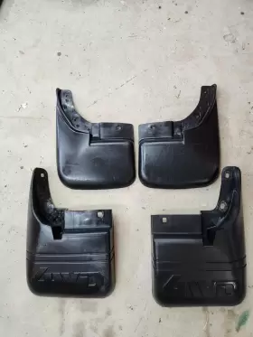 MB944449 MITSUBISHI Mud Flaps Splash Guards Set Delica