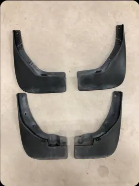 F3850-JM00A NISSAN Front Mud Flaps Splash Guards Rogue