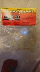 Nos Powerflow Headlight Stone Guards - Small Circular Clear #9810. Fixed Price $30.00.