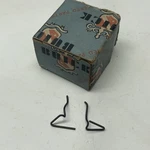 Nos 1942-49 Buick Bumper Guard Emblem Retainer Clips 1331658 Z2. Fixed Price $9.95.