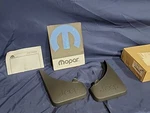 Nos Mopar 07-13 Jeep Molded Splash Guards 82209893. Fixed Price $54.95.